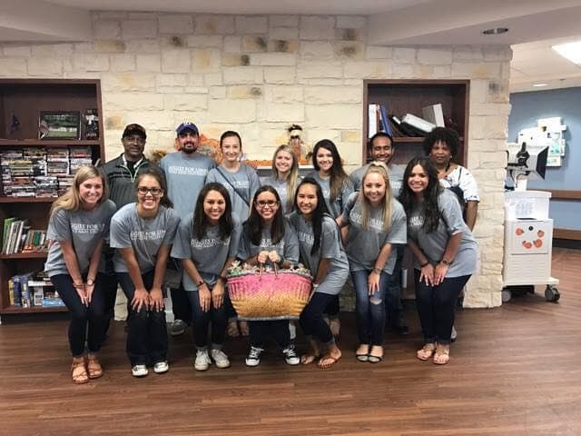 Aggies for Limbs members with recipient